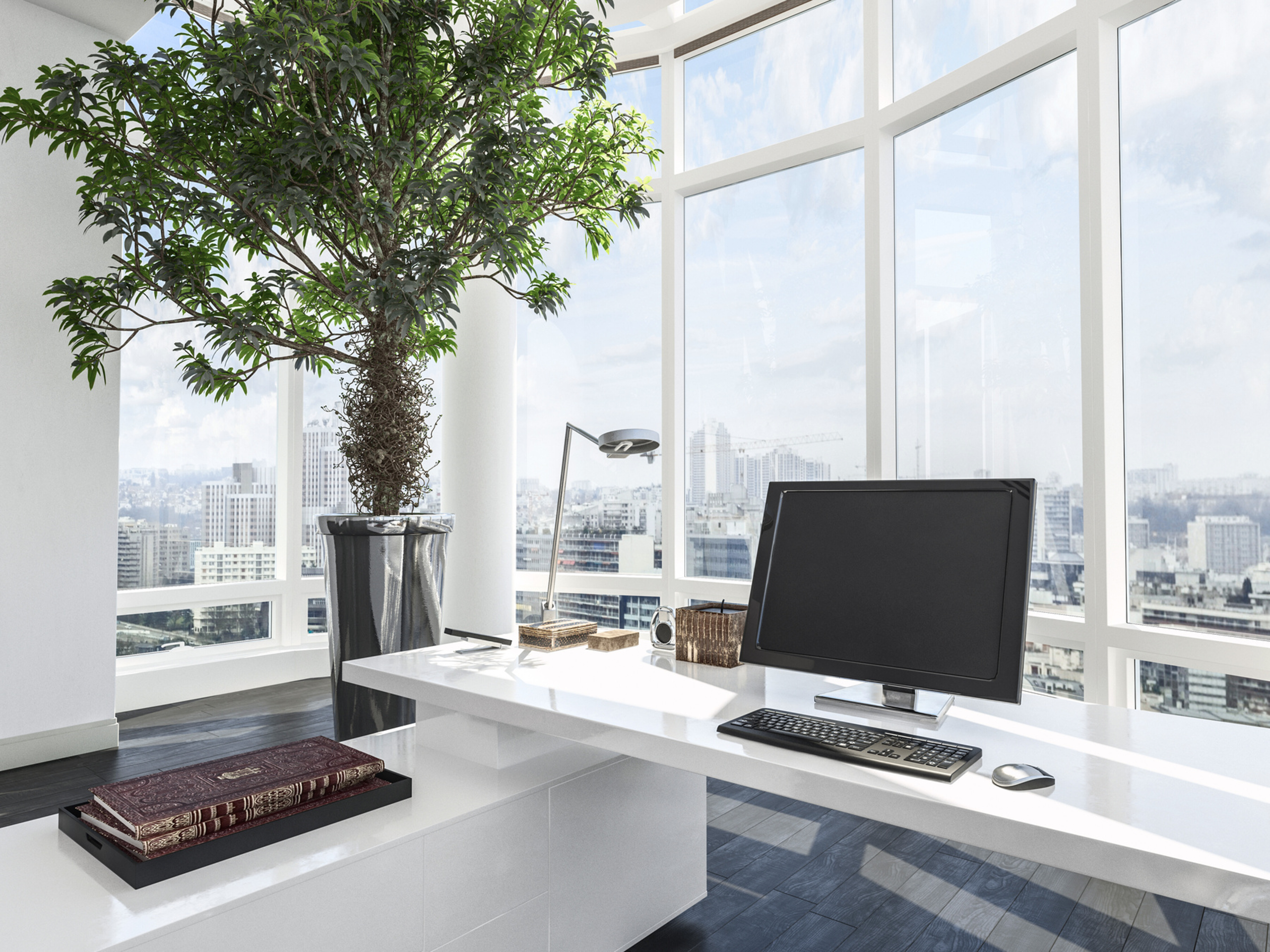 Espacio de trabajo moderno y profesional con computadora, representando un entorno de productividad de Microsoft 365.